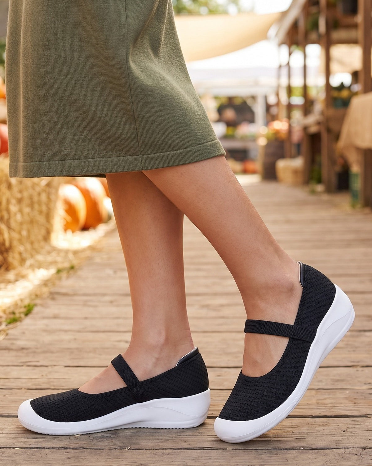 Faye knit Mary Janes worn with an olive skirt at an autumn market