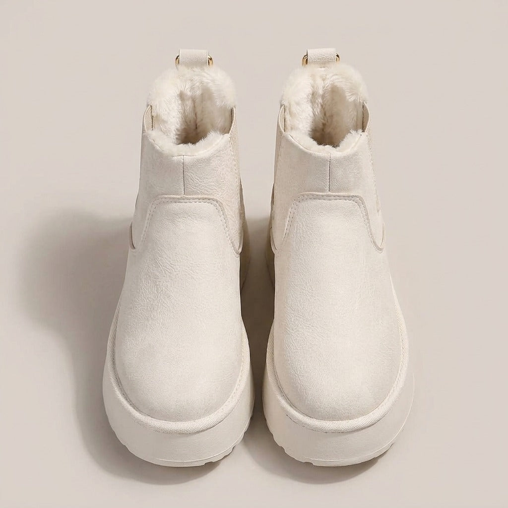 Coral cream snow boots, pair, front view of the plush collars
