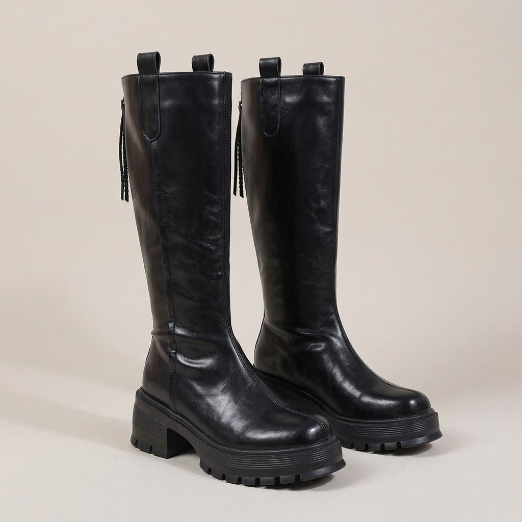 delphine-chunky-lug-sole-knee-high-boots-women-s-black-leather-look-pull-tab-platform-boots 1