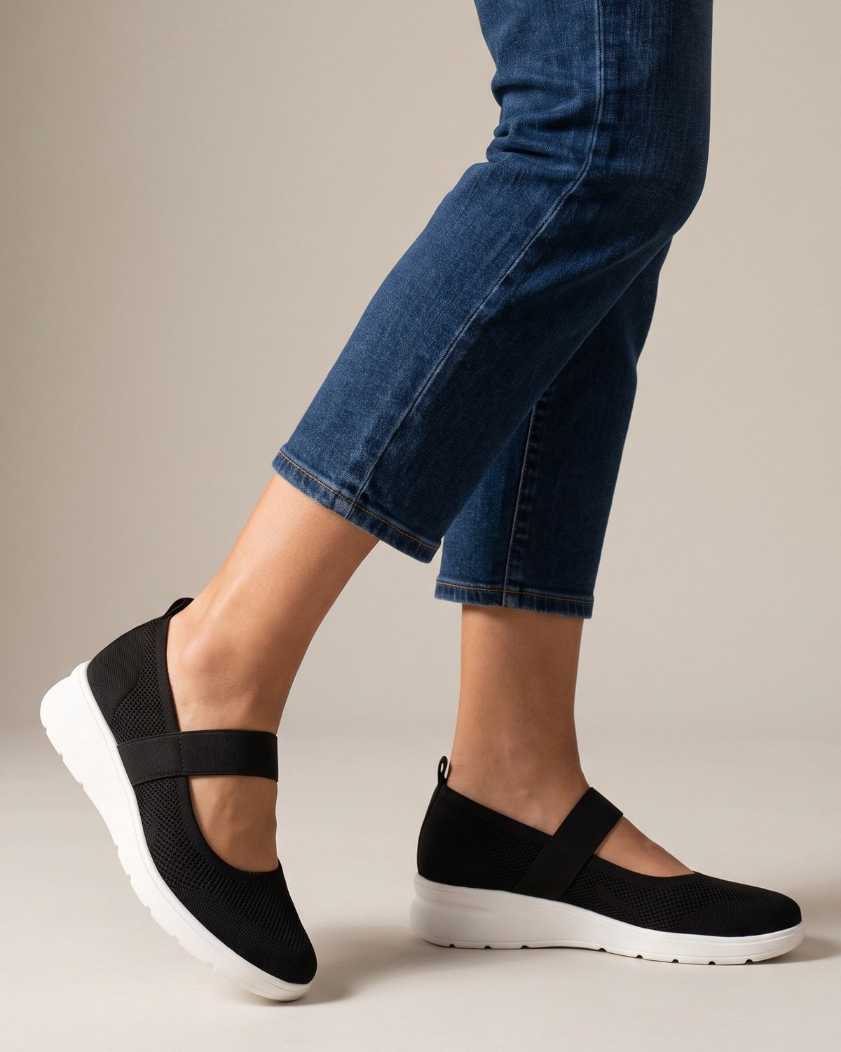 Faye knit Mary Janes worn with jeans, studio shot of legs