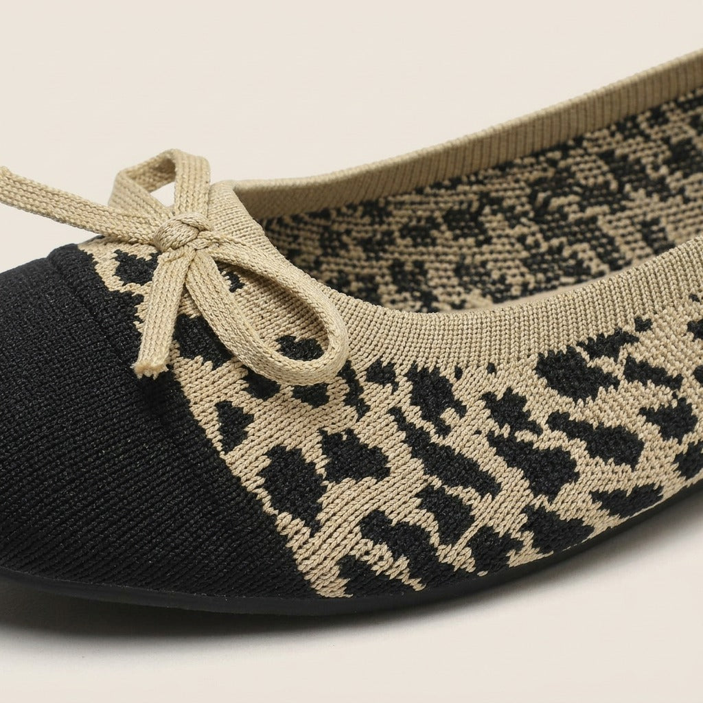 Close-up of the bow and leopard-pattern knit on the Isla flat