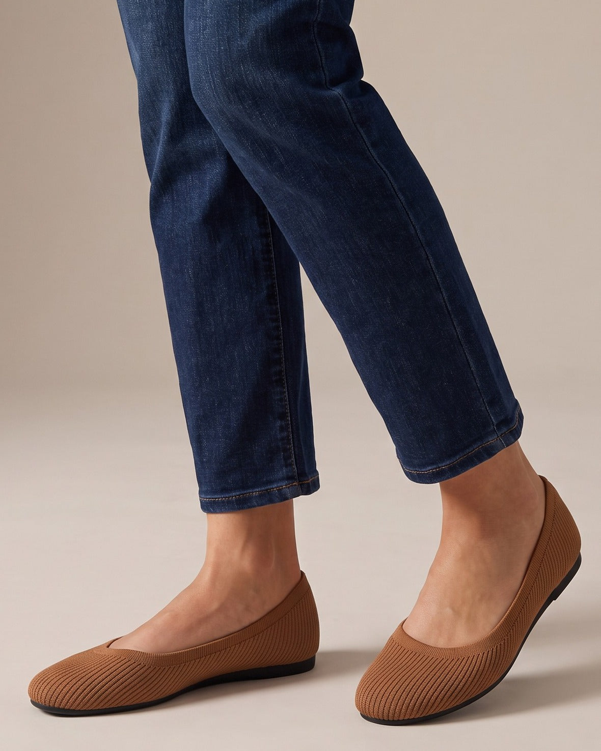 June ribbed knit flats worn with jeans, studio shot of legs