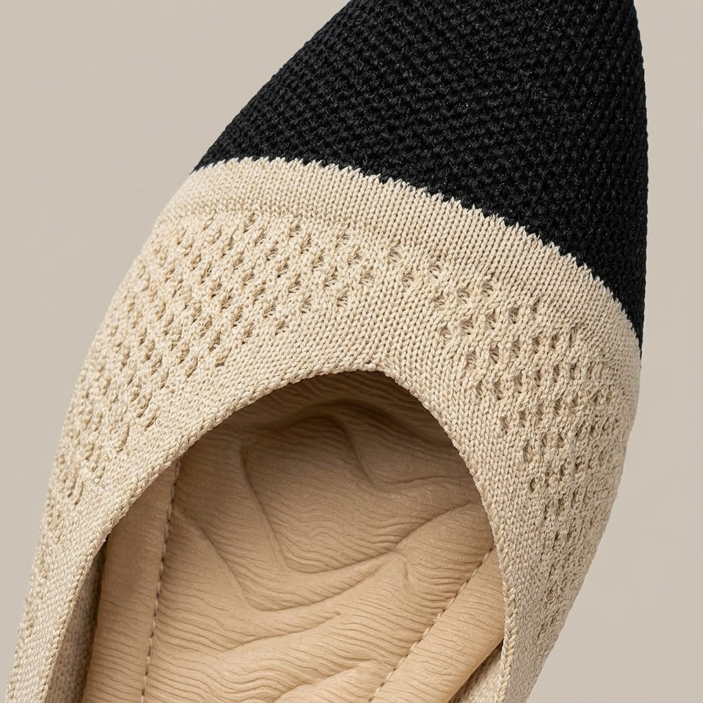 Close-up of the black toe cap and perforated knit on the Lottie flat