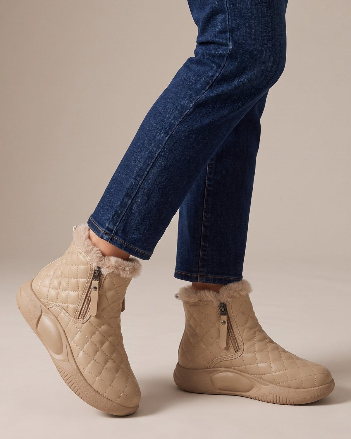 Maisie quilted boots worn with jeans, studio shot of legs