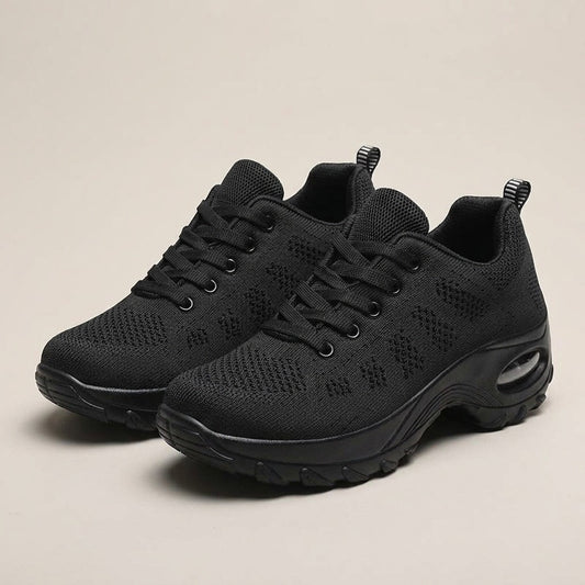 Nell black knit lace-up sneakers with a rocker sole and heel air unit, pair