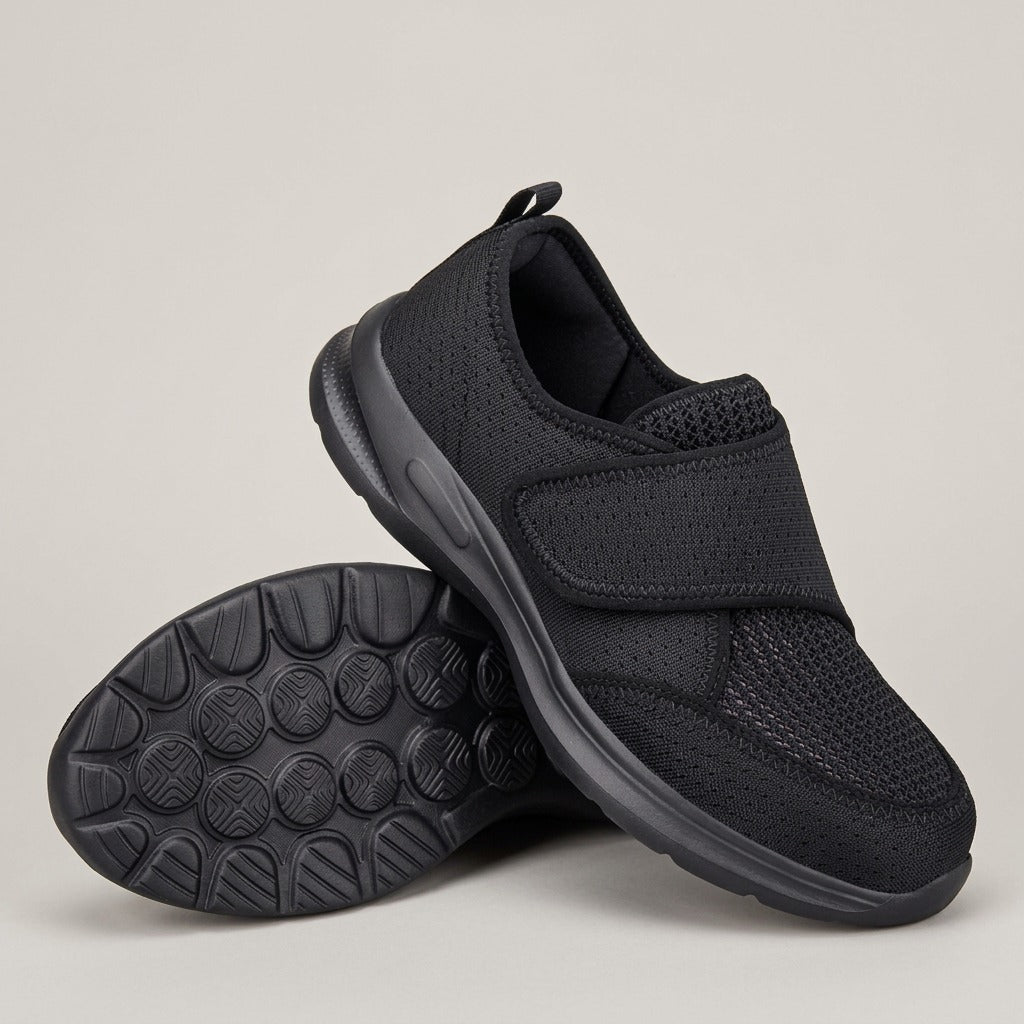 Opal black mesh shoes with one hook-and-loop strap, pair with one sole shown