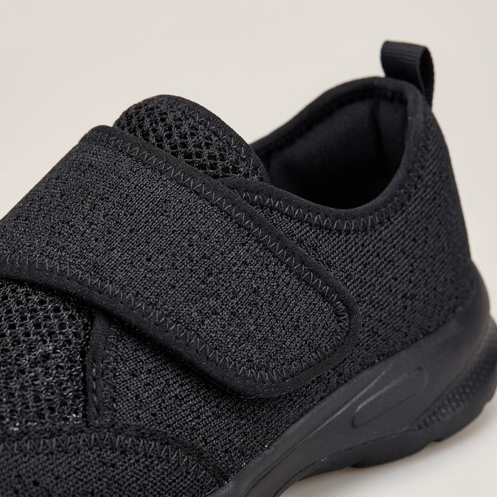 Close-up of the mesh upper and hook-and-loop strap on the Opal shoe