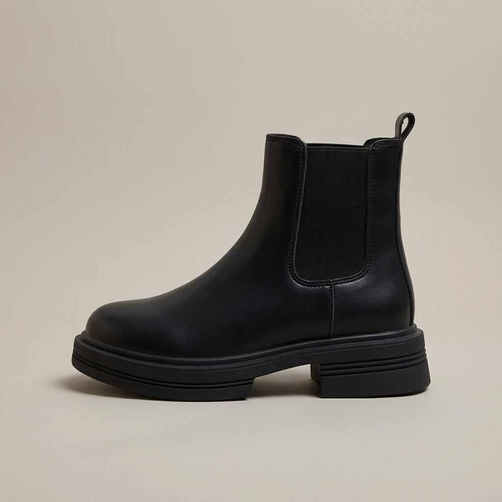 Quinn black chelsea boot, side view