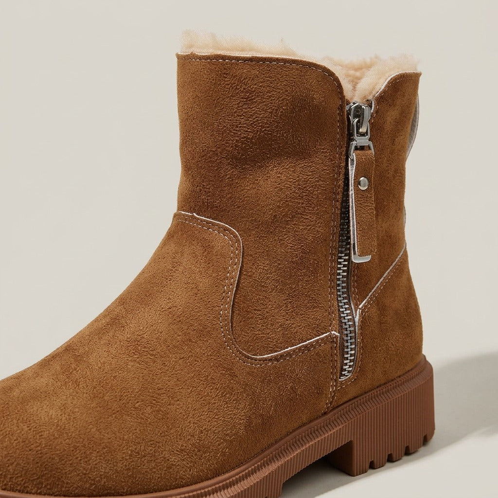 Close-up of the side zip and metal pull on the Simone boot
