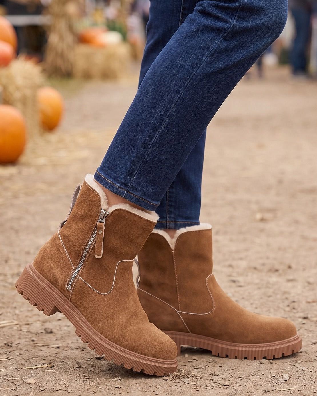 Simone brown ankle boots worn with jeans at an autumn market