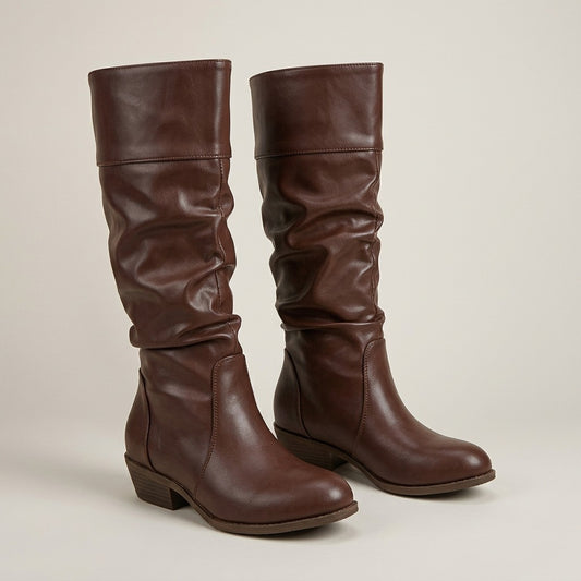 Stella brown leather-look slouch riding boots with low stacked heel, pair