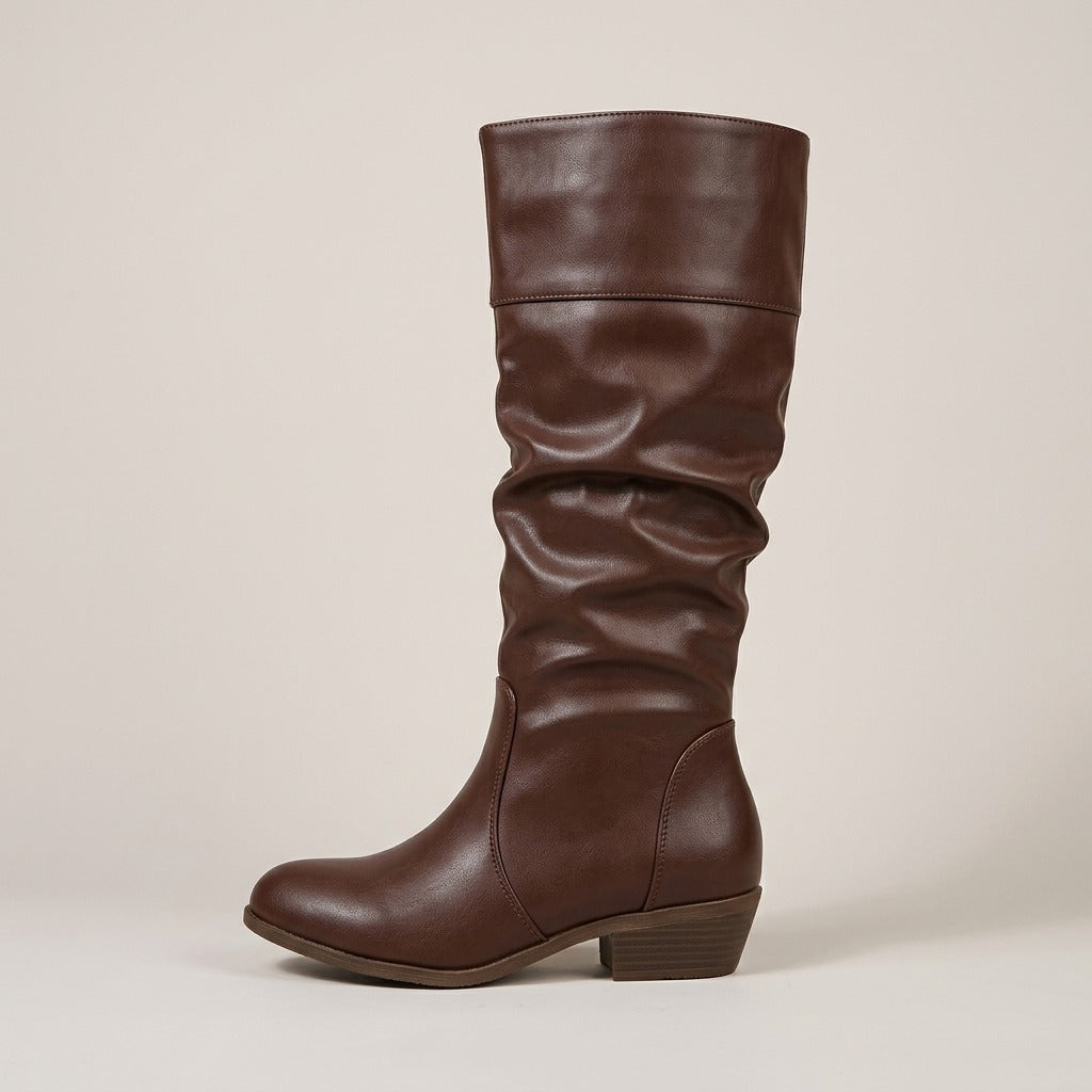 Stella brown riding boot, side view of the slouched shaft