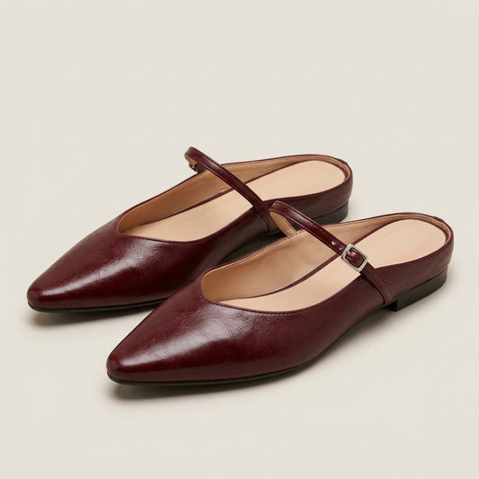 Verity wine-red pointed-toe backless mules with a buckled Mary Jane strap, pair