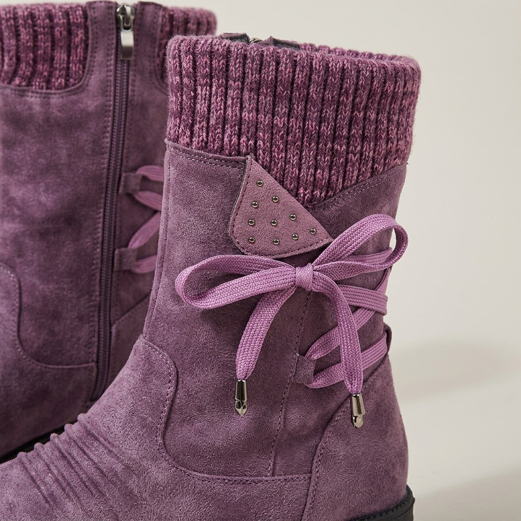 Close-up of the knit cuff, studded side tab and ribbon lace on the Violet boot