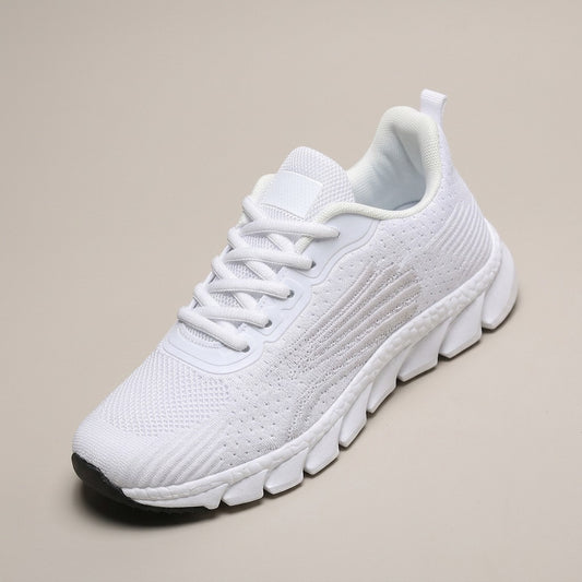 Wren white knit lace-up sneaker with a thick white sole, three-quarter view